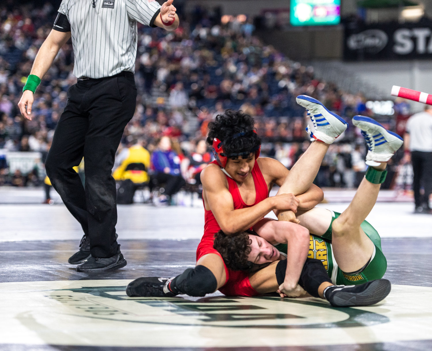 Black Hills’ Roberto Rivera-Jesus, 106 pounds, competes against Shadle Park’s Lucas Horner at Mat Classic XXXIV on Friday, February 17, 2023, at the Tacoma Dome. (Joshua Hart/For The Chronicle)